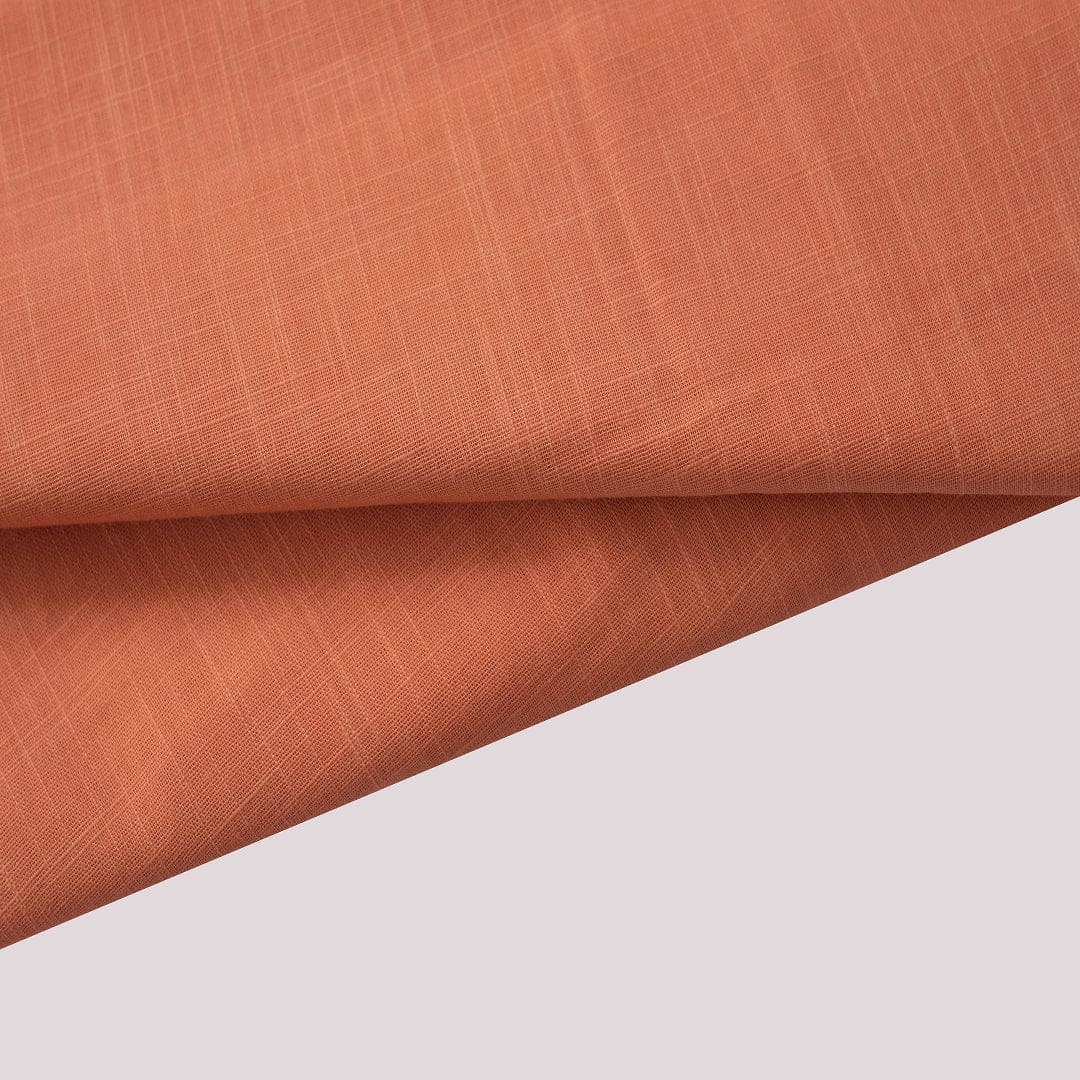 Orange Slub Cotton Fabric - Charkha TalesOrange Slub Cotton Fabric