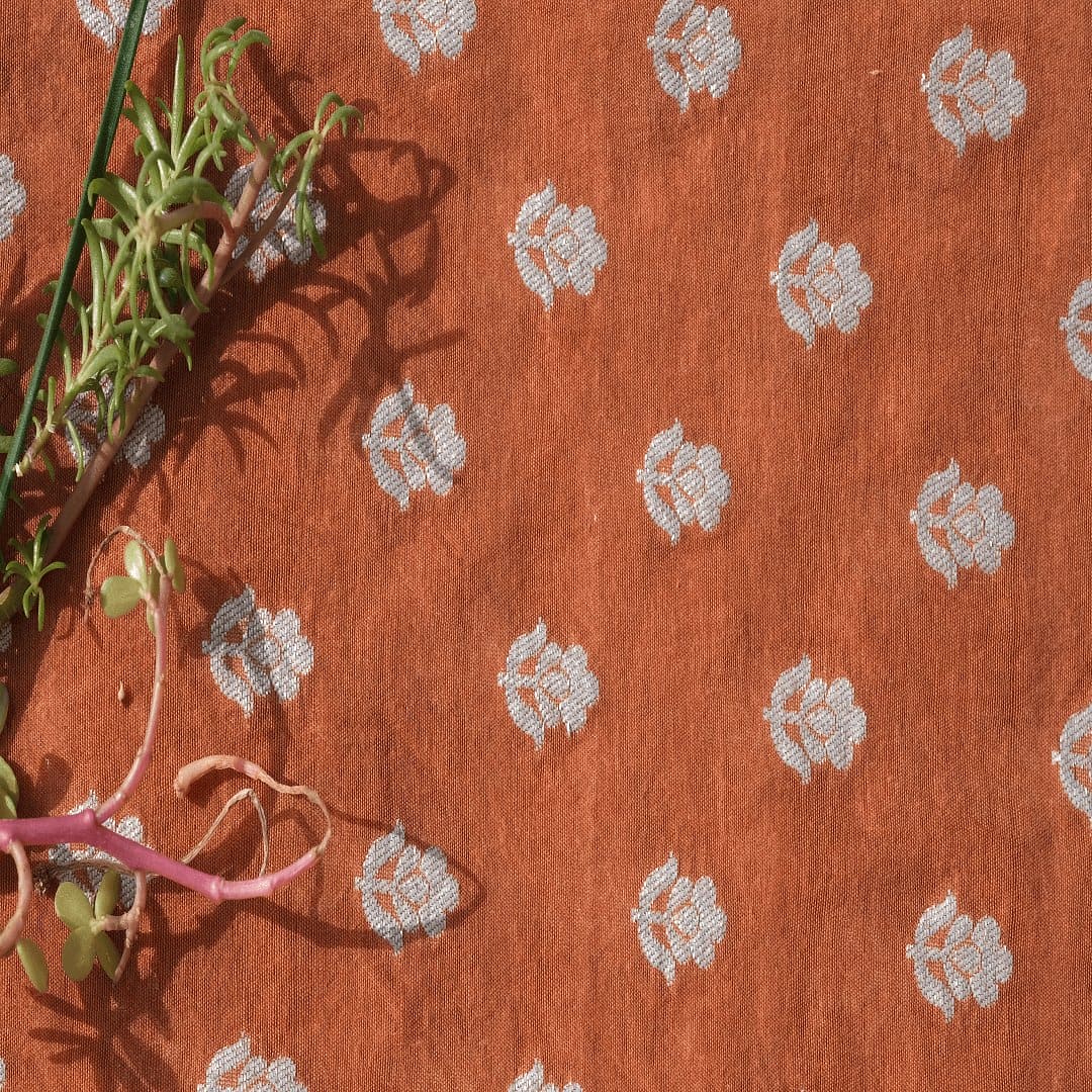 Rust Orange Floral Silk Chanderi Fabric - Charkha TalesRust Orange Floral Silk Chanderi Fabric