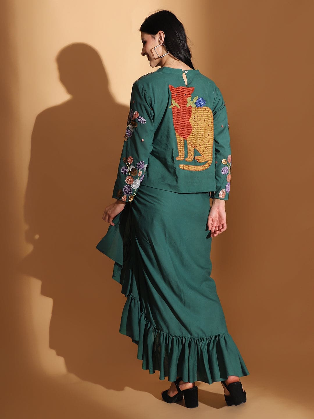 Gond Artwork Dress With Ruffle Skirt - Emerald Green Charkha Tales Gond Artwork Dress With Ruffle Skirt - Emerald Green Charkha Tales
